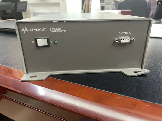 Агилент 87422A Подержанное питание 12VDC 15VDC 70W с 83017A 0275 и нормальным режимом тока 4 мАрм